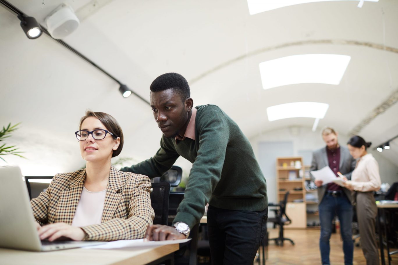 SNS | contemporary business people working office min min scaled